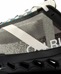 On Women's Cloudsurfer Next Black/Dew Hot