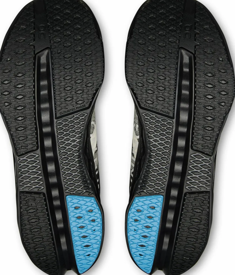On Women's Cloudsurfer Next Black/Dew Hot